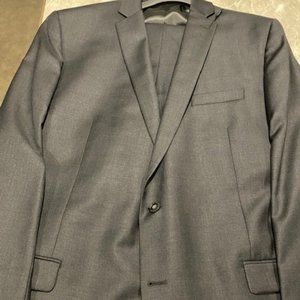 PRICE DROP!!  Calvin Klein two piece gray suit.  NEW With Tags